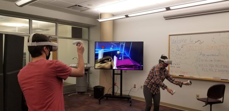 two students using virtual reality headsets