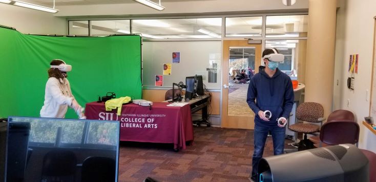 two students using virtual reality headsets